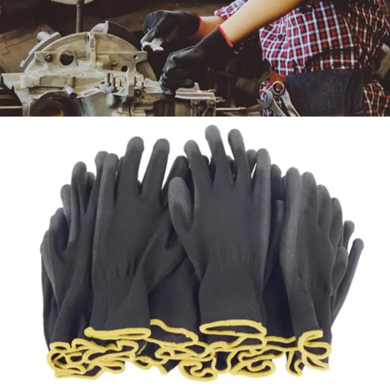 Black gloves with yellow accents on a white background, with a person working in the background.